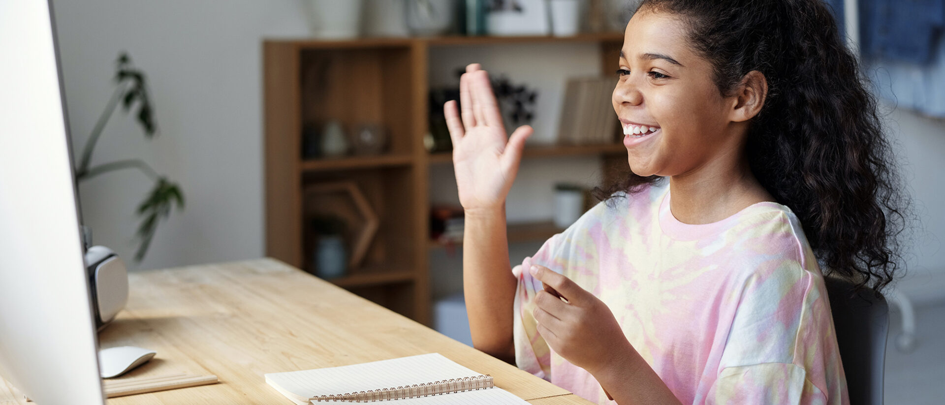 Student raising her hand image